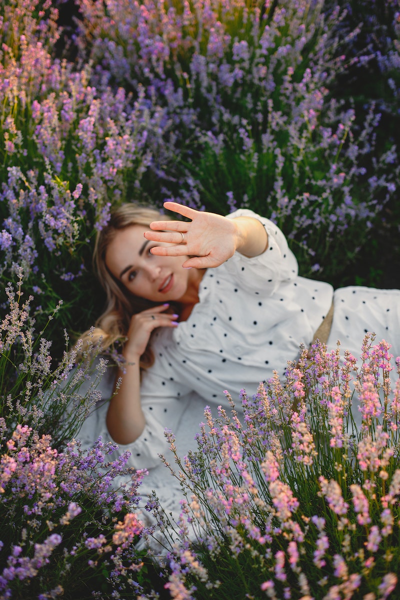 Woman Lying in Lavender Field